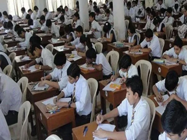 Students taking exam in a collge.