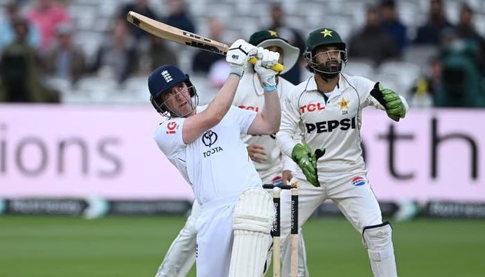 A player of England strikes a four.