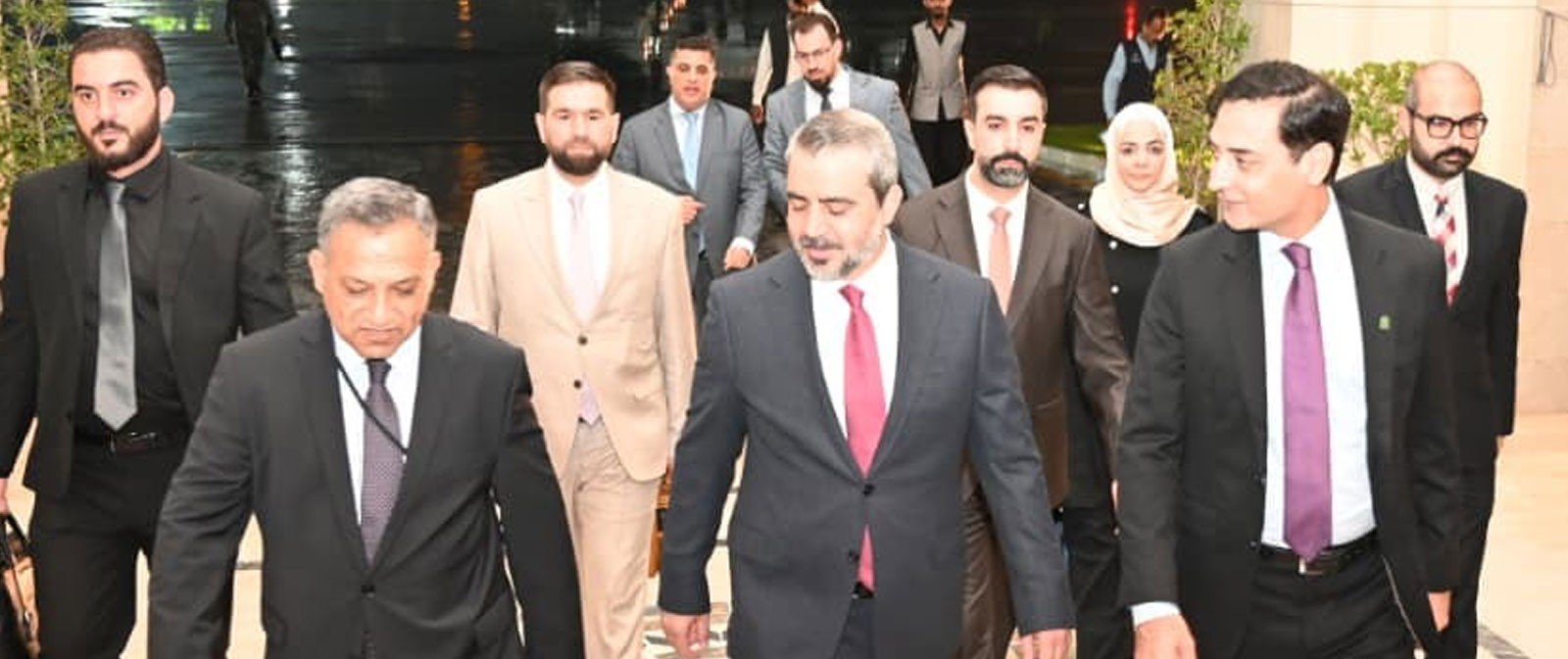 Syrian foreign minister being received at Islamabad airport.