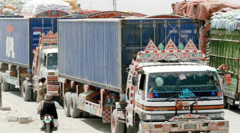 Goods transport vehicles stand parked due to a strike.