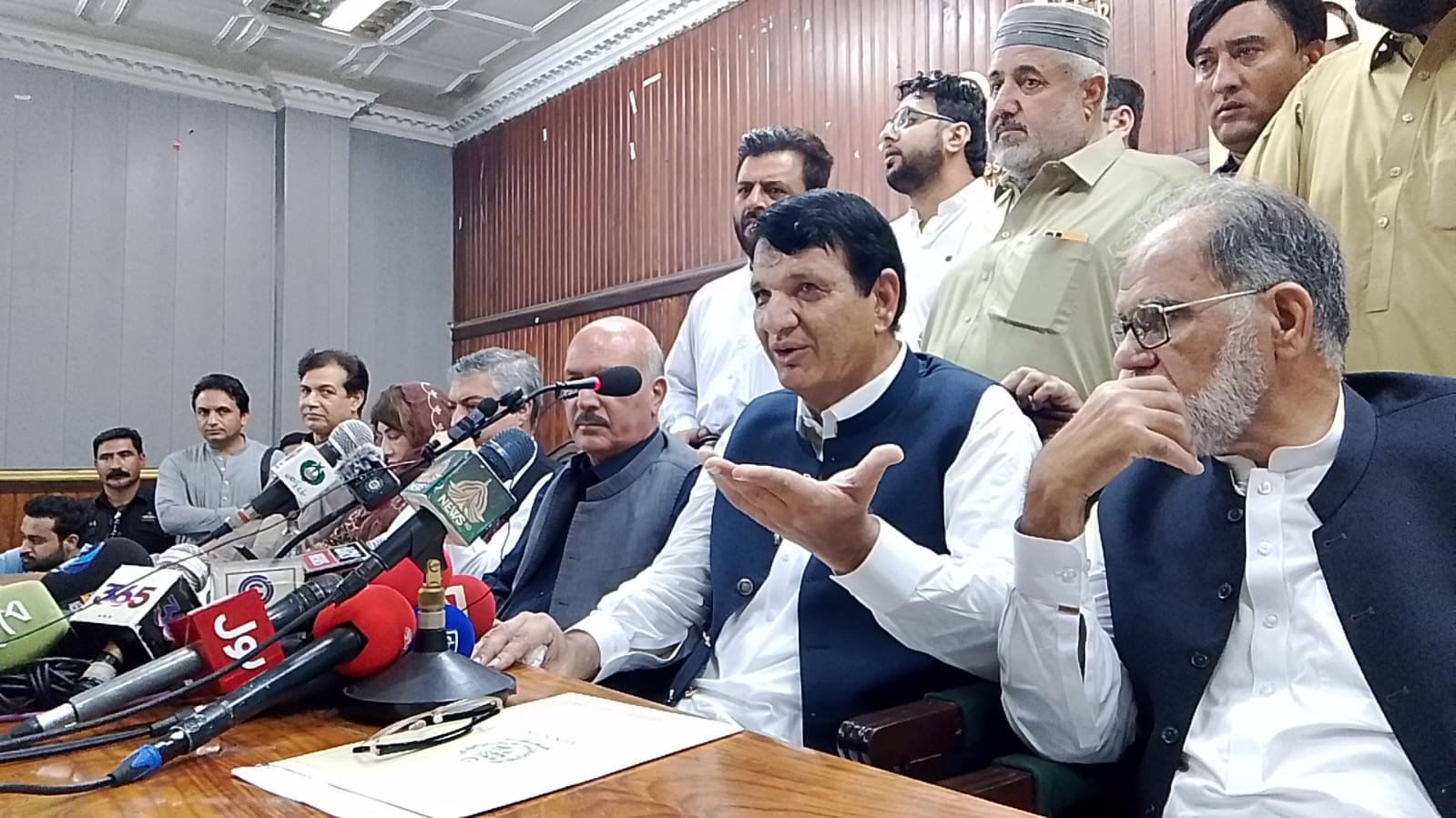 Amur Muqam addressing a press conference