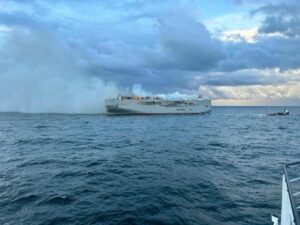 Ship carrying cars catches fire, one crew member dead