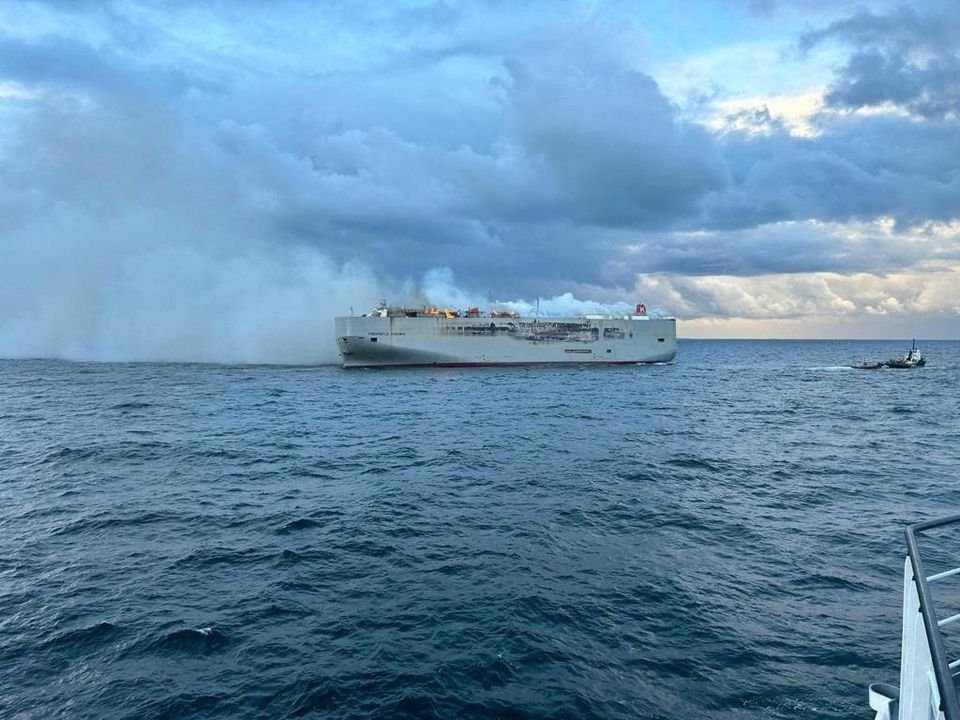 Ship carrying cars catches fire, one crew member dead