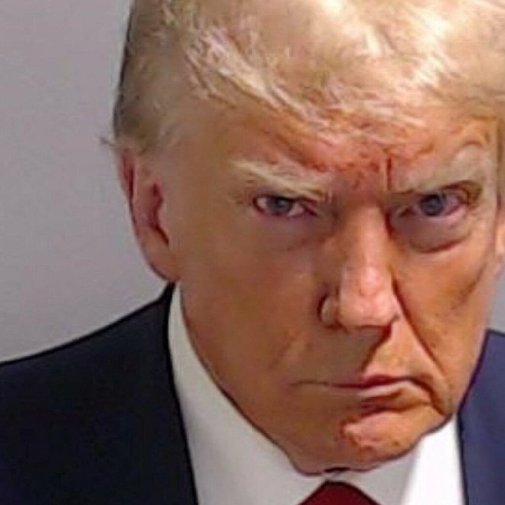 Trump booked at jail
